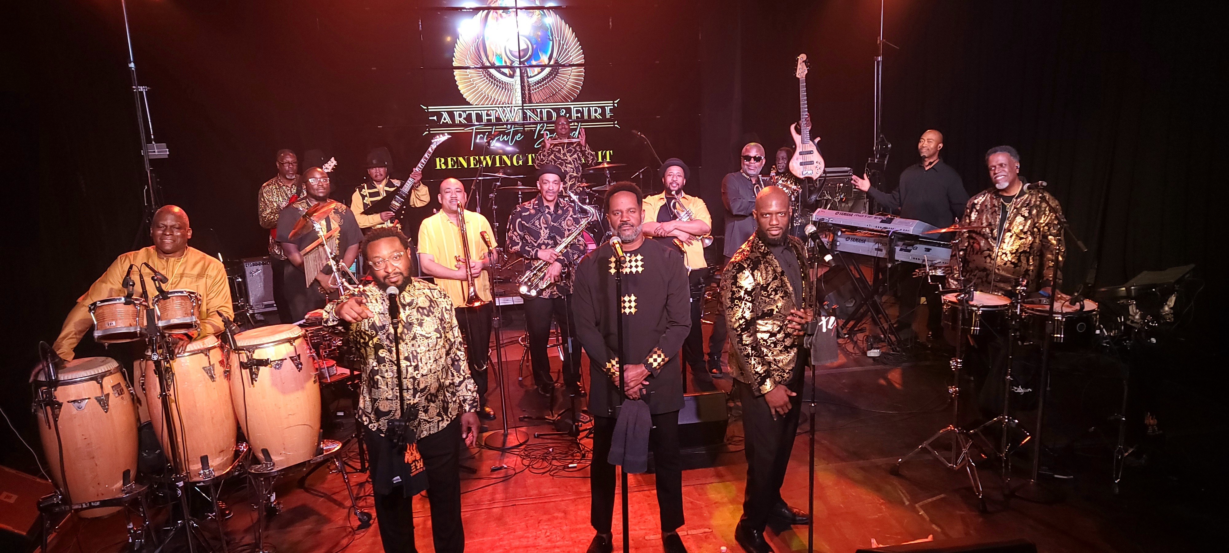 Full earth, wind, and fire band performing on stage